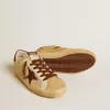 Super-Star voor dames in beige ponyhuid met bruine suède ster en hielstuk.
