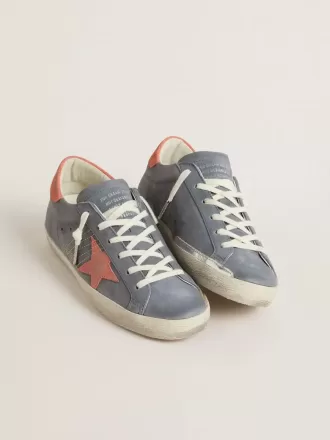 Super Star voor dames in blauw nubuck met roze suède ster en hielstuk