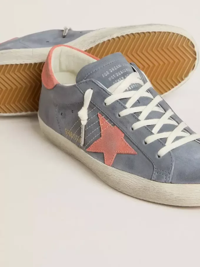 Super Star voor dames in blauw nubuck met roze suède ster en hielstuk