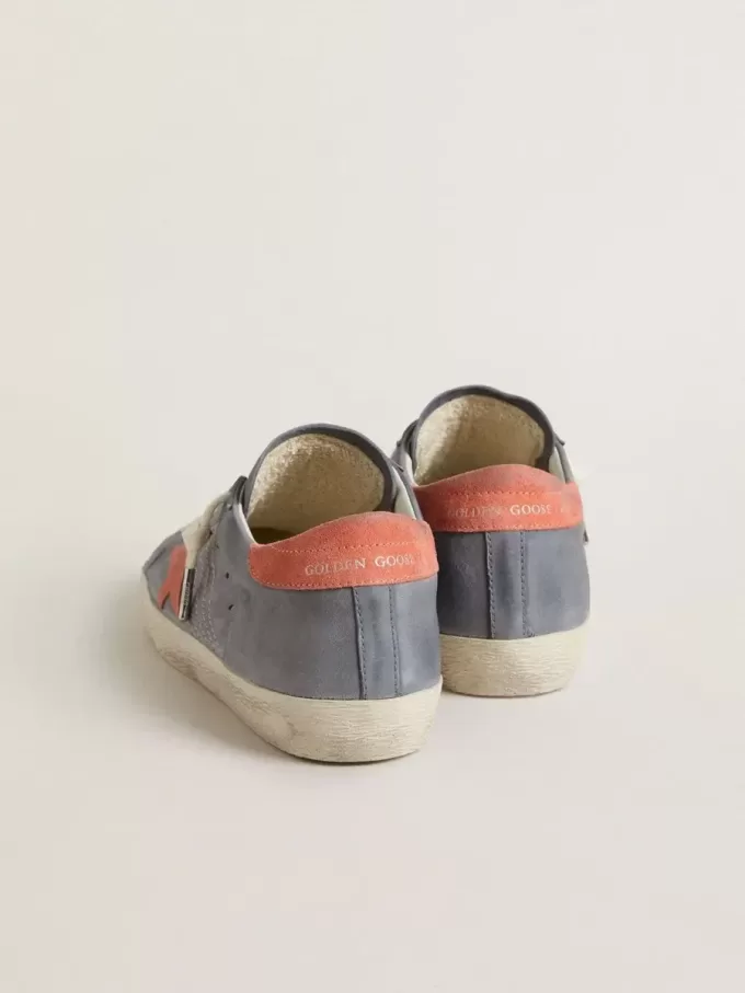 Super Star voor dames in blauw nubuck met roze suède ster en hielstuk