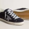 Super-Star voor dames in blauw suède, met zilveren glitterster en leren hielstuk