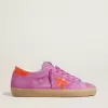 Super-Star voor dames in fuchsia suède met fluorescerende oranje gelamineerde leren ster en hielstuk.