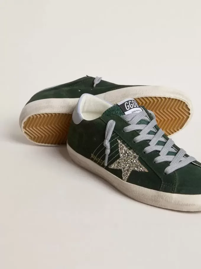 Super-Star voor dames in groen suède, met zilveren glitterster en leren hielstuk