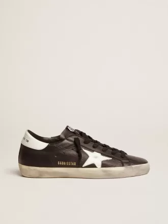 Super-Star voor dames in zwart leer met witte leren ster en hielstuk.