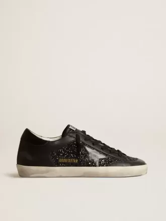 Super-Star voor dames in zwart nappa en glitter met glanzende zwarte leren ster