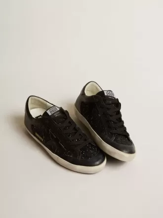 Super-Star voor dames in zwart nappa en glitter met glanzende zwarte leren ster