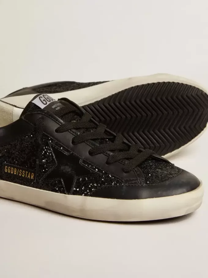 Super-Star voor dames in zwart nappa en glitter met glanzende zwarte leren ster