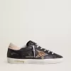 Super-Star voor dames in zwart nappaleer met zebraprint ponyhuidster en beige leren hielstuk