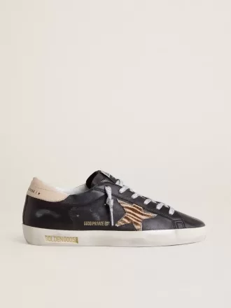 Super-Star voor dames in zwart nappaleer met zebraprint ponyhuidster en beige leren hielstuk