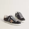 Super-Star voor dames in zwart nappaleer met zebraprint ponyhuidster en beige leren hielstuk