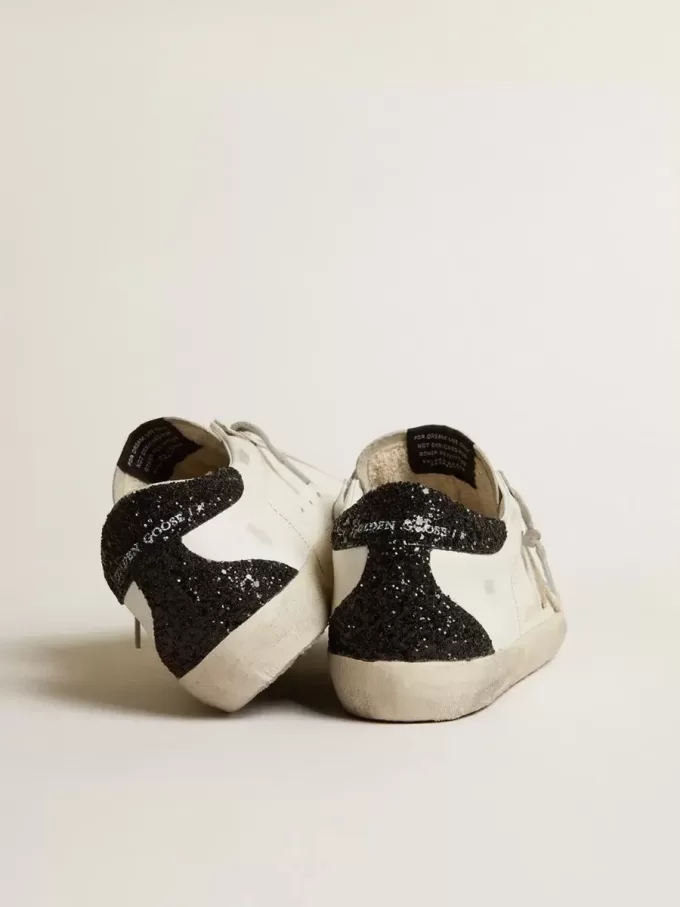 Super-Star voor dames met gouden ster en zwarte glitter hielband