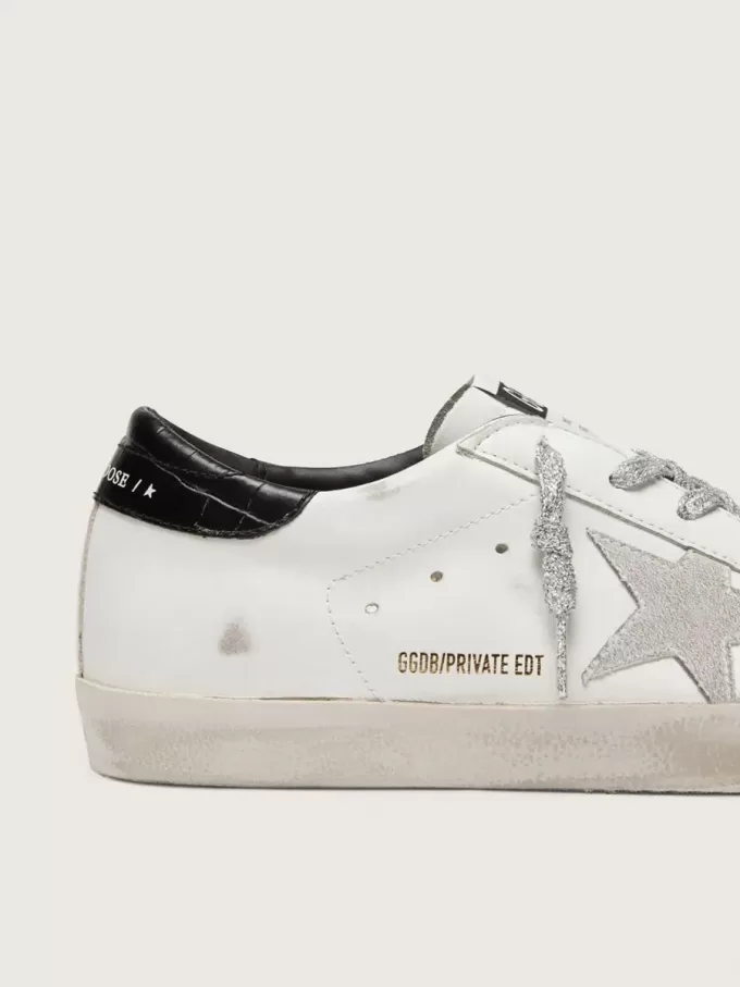 Super-Star voor dames met witte suède ster en zwarte haklip met krokodillenprint