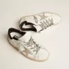 Super-Star voor dames met zwarte hielklep en metalen studs