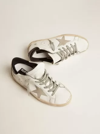 Super-Star voor dames met zwarte hielklep en metalen studs