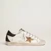 Super-Star voor dames van nappaleer met gouden glitterster en zwarte glitterhaklip.