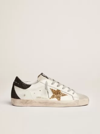 Super-Star voor dames van nappaleer met gouden glitterster en zwarte glitterhaklip.