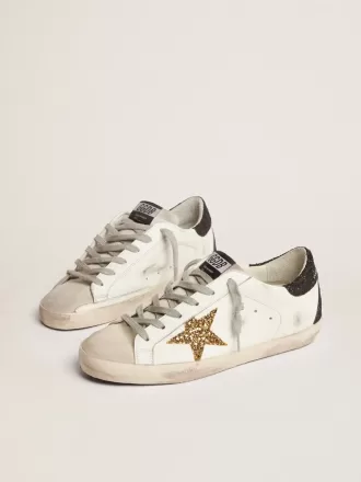 Super-Star voor dames van nappaleer met gouden glitterster en zwarte glitterhaklip.