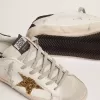 Super-Star voor dames van nappaleer met gouden glitterster en zwarte glitterhaklip.