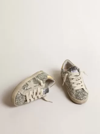 Super-Star Young in glitter met een suède ster en gouden hiellip.