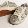 Super-Star Young in glitter met een suède ster en gouden hiellip.