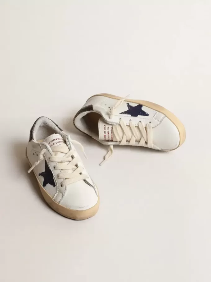 Super-Star Young in nappa met een gedrukte ster en zwarte hielband