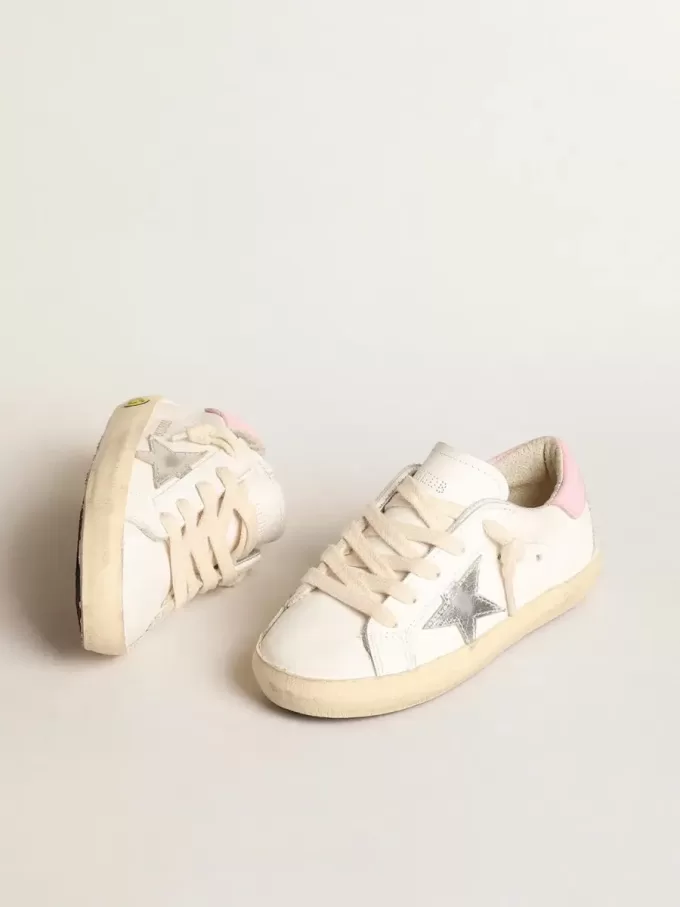 Super-Star Young met zilveren leren ster en roze hiellip