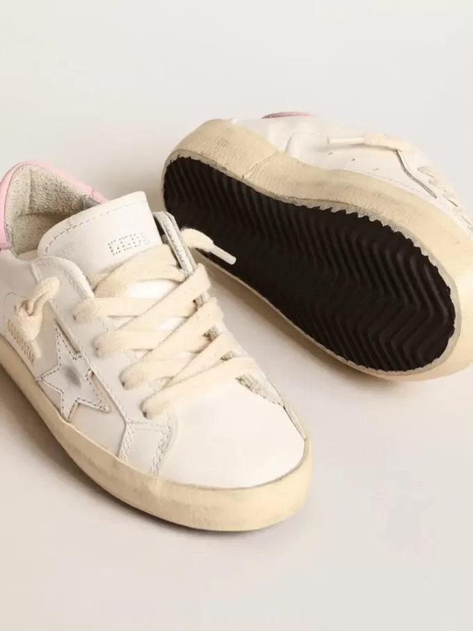 Super-Star Young met zilveren leren ster en roze hiellip