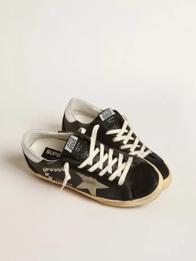Superster voor dames in zwart leer en suède met zilveren studs