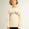 Sweatshirt in oud wit met veelkleurige gouden letters op de voorkant