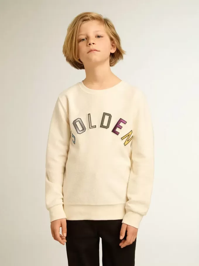 Sweatshirt in oud wit met veelkleurige gouden letters op de voorkant