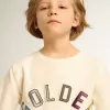 Sweatshirt in oud wit met veelkleurige gouden letters op de voorkant