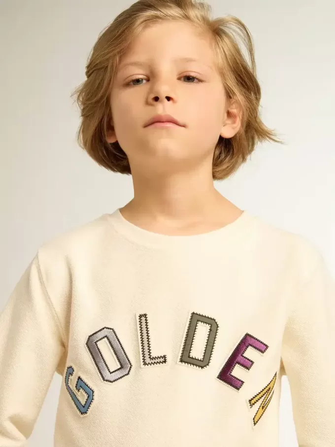 Sweatshirt in oud wit met veelkleurige gouden letters op de voorkant