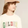 Sweatshirt in oud wit met veelkleurige gouden letters op de voorkant