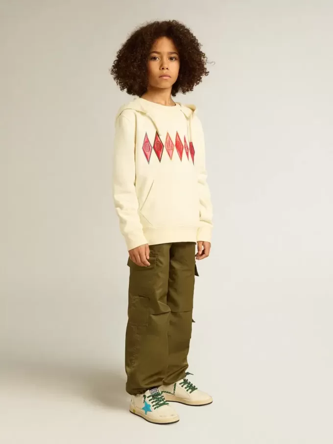 Sweatshirt met capuchon in versleten wit met gouden borduursel op de voorkant.