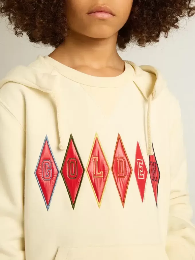 Sweatshirt met capuchon in versleten wit met gouden borduursel op de voorkant.