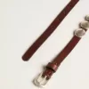 Trinidad dunne riem van donkerbruin leer met zilveren studs