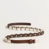 Trinidad dunne riem van donkerbruin leer met zilveren studs