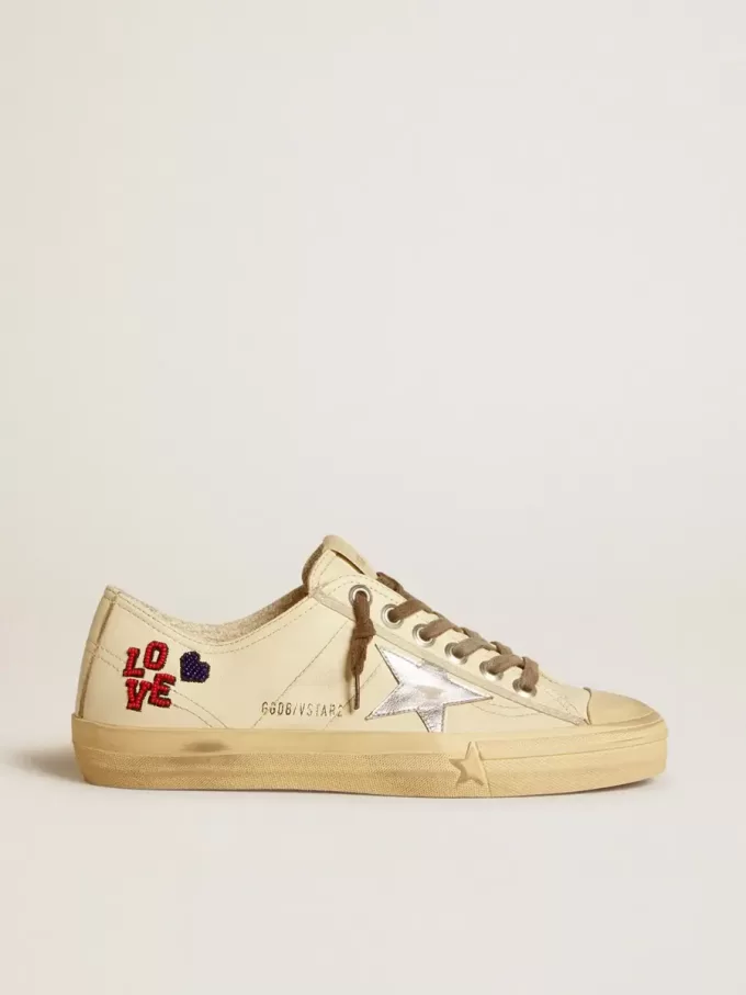 V-Star in ecru nappa met zilveren nappa ster en kralenborduursel