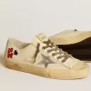 V-Star in ecru nappa met zilveren nappa ster en kralenborduursel