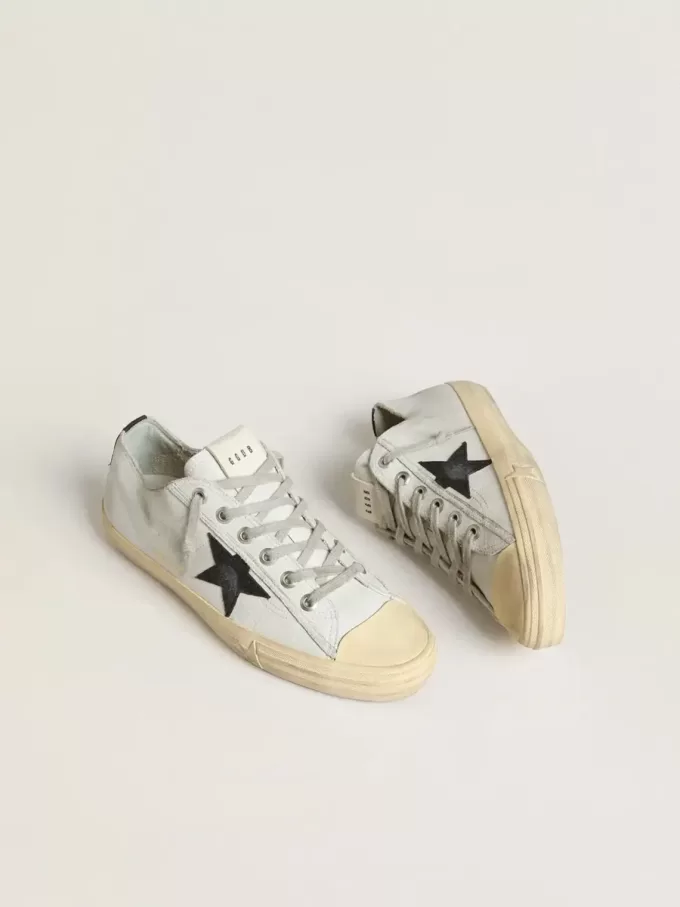V-Star in leer met zwarte ster en hielstuk van leer met krokodillenprint