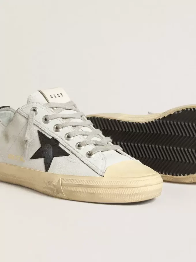 V-Star in leer met zwarte ster en hielstuk van leer met krokodillenprint