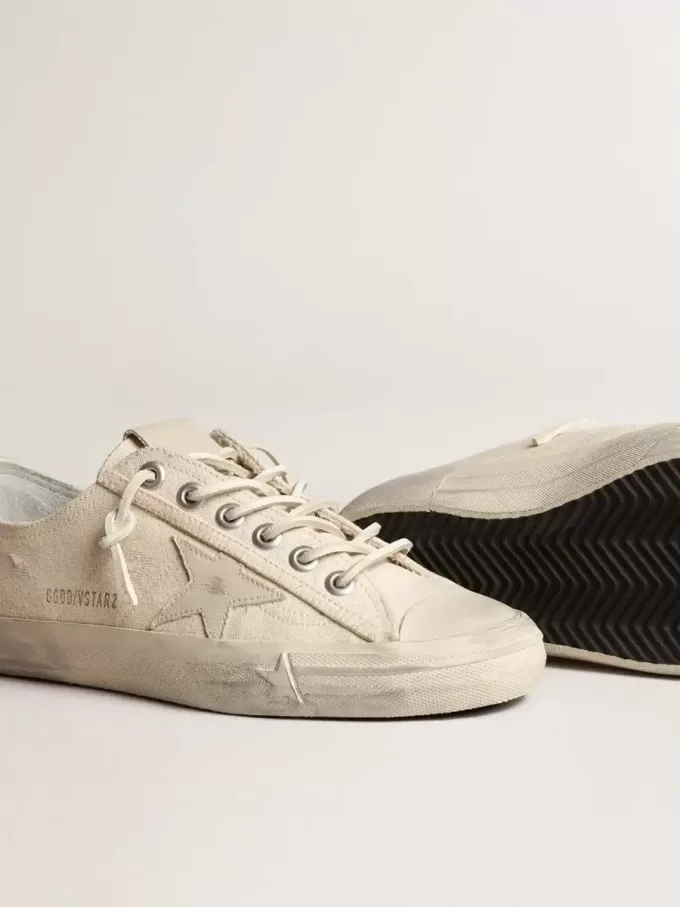 V-Star in lichtcrèmekleurig canvas met melkwitte leren ster