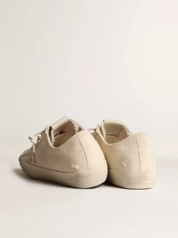 V-Star in lichtcrèmekleurig canvas met melkwitte leren ster