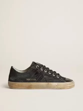 V-Star in middernachtblauw denim met zwarte leren ster en neus