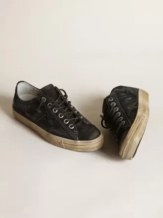 V-Star in middernachtblauw denim met zwarte leren ster en neus