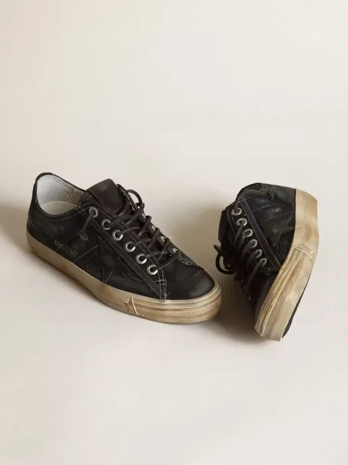 V-Star in middernachtblauw denim met zwarte leren ster en neus
