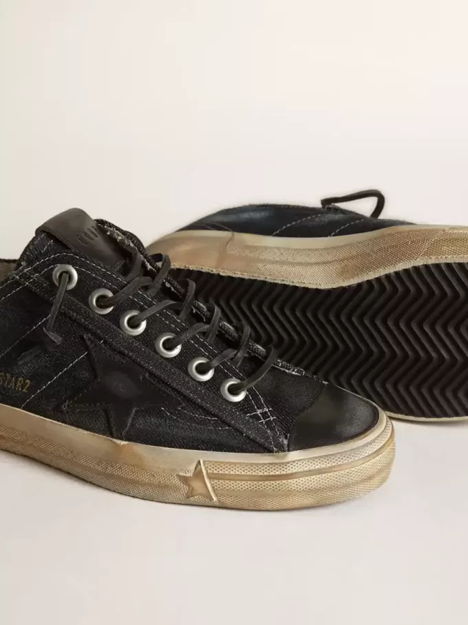 V-Star in middernachtblauw denim met zwarte leren ster en neus
