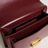 Venezia-tas in bordeauxrood leer met gouden details