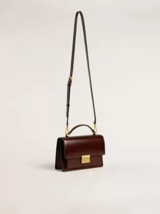 Venezia-tas in donkerbruin gelamineerd leer met gouden details