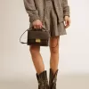 Venezia-tas in zwart distressed leer met gouden details